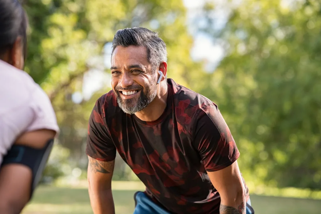 man taking break after jog with girlfriend